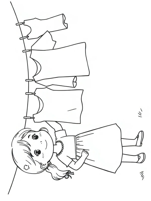 Une fille raccroche le linge